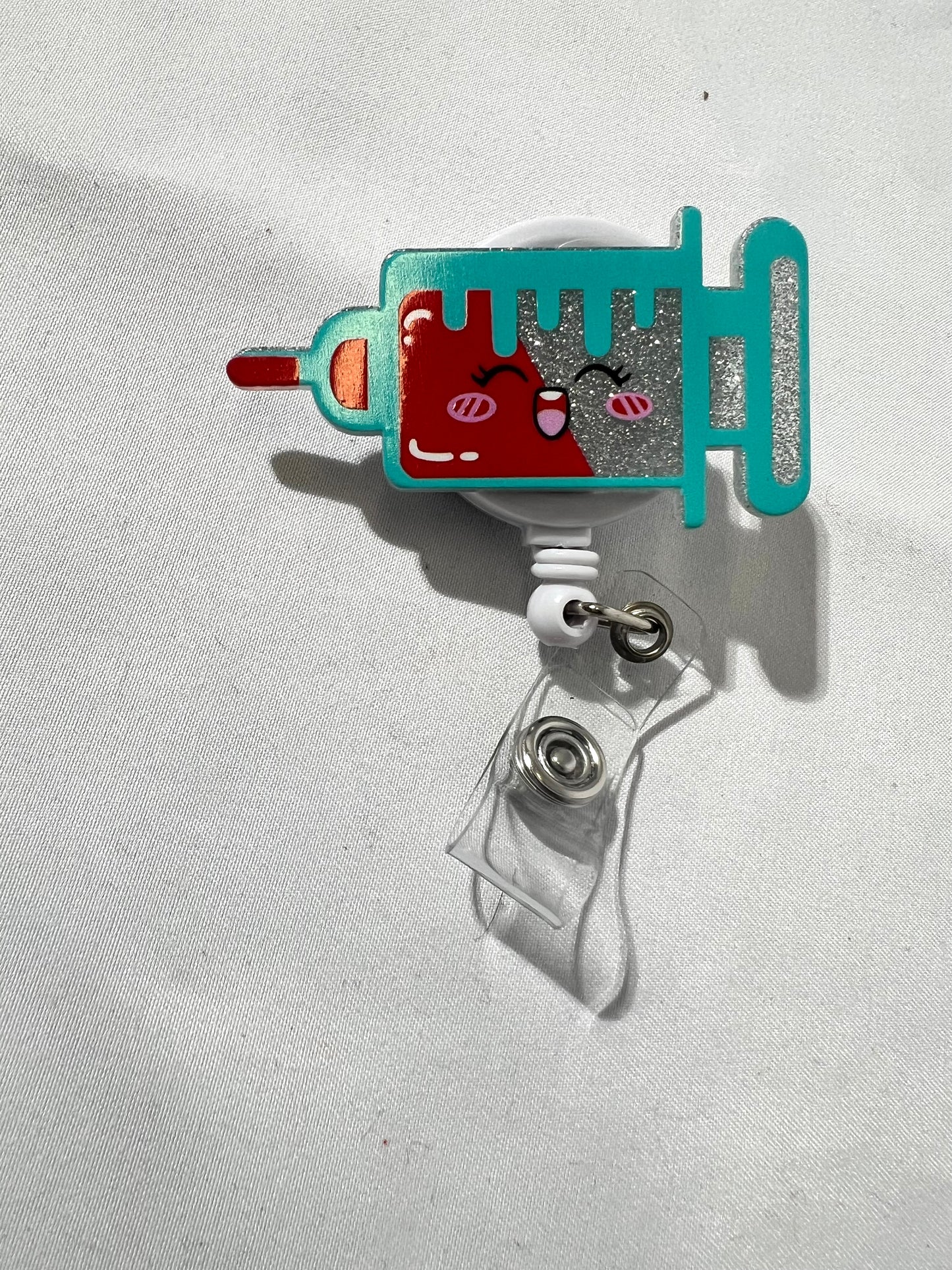 SMILEY FACE SYRINGE ID REEL